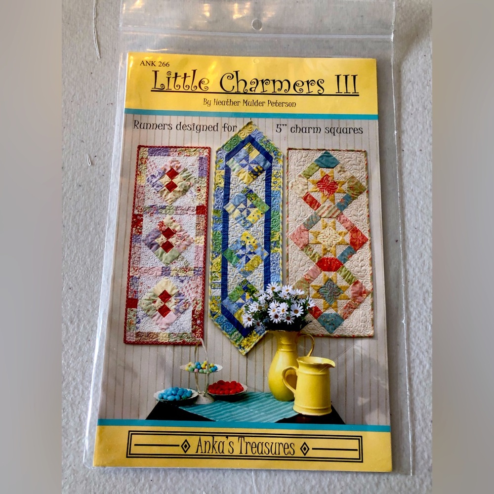 Table Runner patterns, pot holders, hot pad & tee towels but mainly runners.